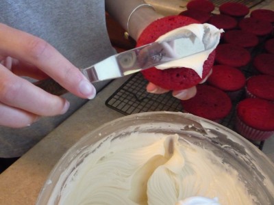 Frosting the cupcakes